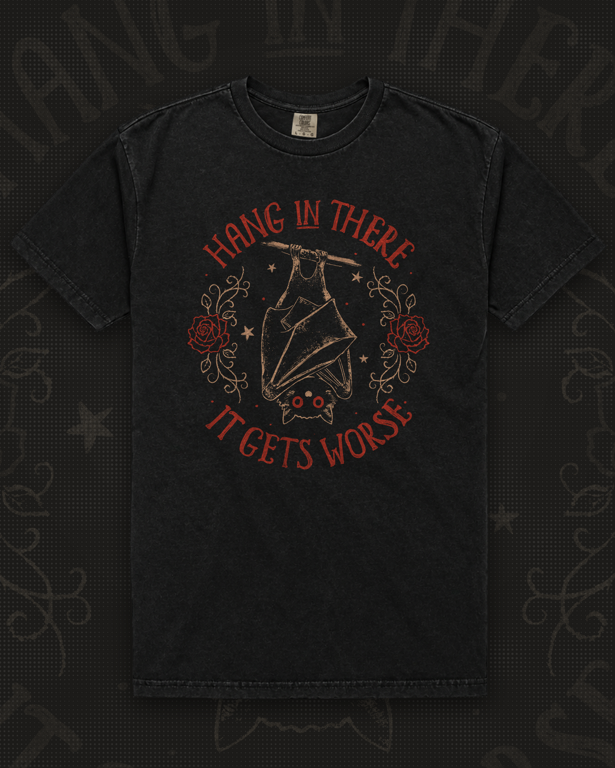 Upside-down bat hanging from a branch between red roses, circled by red lettering reading Hang In There It Gets Worse graphic on black t-shirt – Hang In There It Gets Worse Tee by CREEPTEE