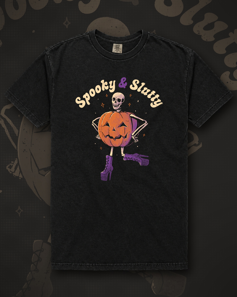 Skeleton wearing a jack-o'-lantern costume and purple platform boots posing under the words Spooky & Slutty graphic on black t-shirt – Spooky And Slutty Tee by CREEPTEE