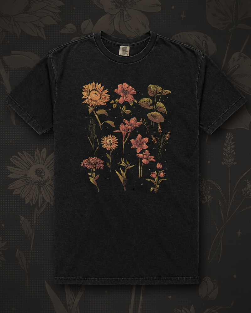 Arrangement of pressed sunflowers, lilies and wildflowers in muted autumn tones graphic on black t-shirt – Twilight Botanica Tee by CREEPTEE