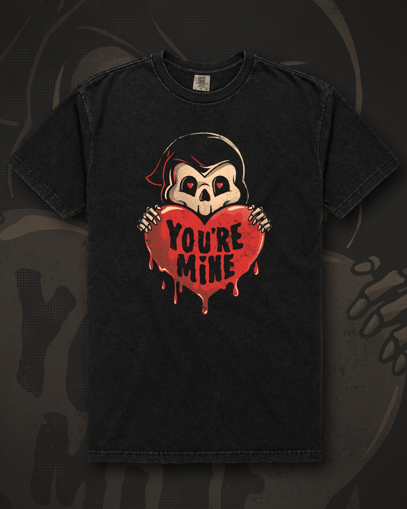 Small grim reaper with heart-shaped eyes clutching a dripping red heart that reads You're Mine graphic on black t-shirt – You're Mine Tee by CREEPTEE